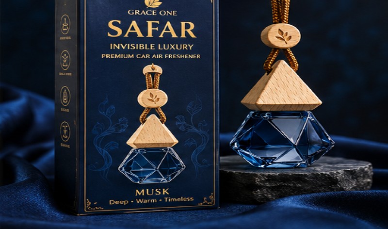 Musk box and bottle on blue velvet